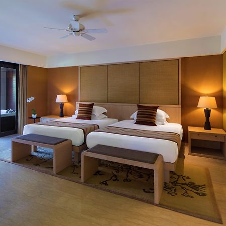 Hotel Conrad Bali Nusa Dua  Esterno foto A bedroom at the resort